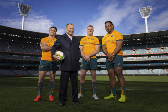 Eddie Jones with Melbourne Rebels players Andrew Kellaway, Rece Hodge and Pone Fa’amausili.