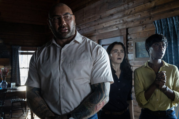 Dave Bautista, Abby Quinn, and Nikki Amuka-Bird in Knock At The Cabin.