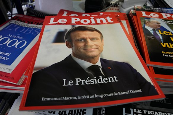 A special issue of a magazine with its front-page showing French President Emmanuel Macron and released Monday, April 25.