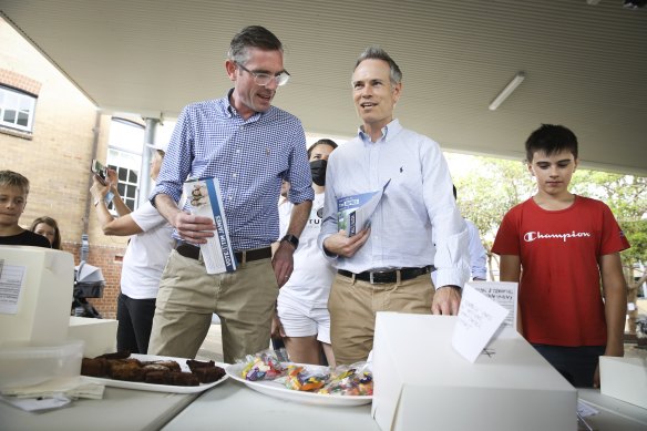 NSW Premier Perrottet and Willoughby candidate Tim James at Cammeray Public School on Saturday.