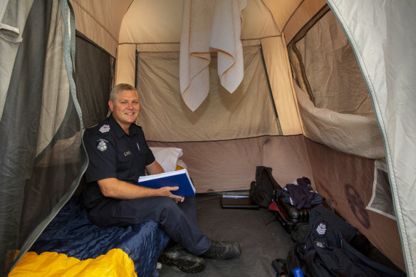 Acting Senior Sergeant Colin Shepherd in his tent at Cann River.
