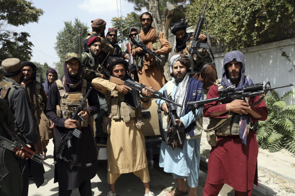 Taliban fighters pictured in Kabul on Thursday.