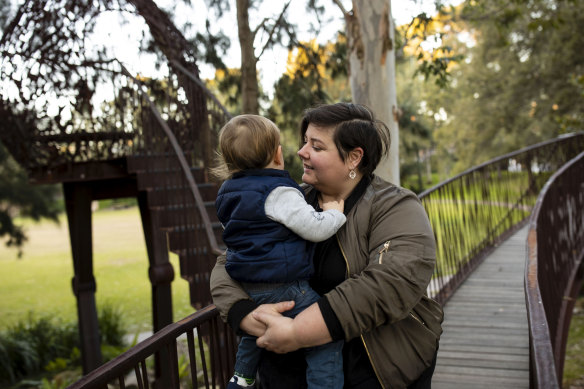 Kara Huxtable with her 21-month-old son. Kara works in the travel industry and has been stood down. She is considering cutting back on childcare due to the cost.