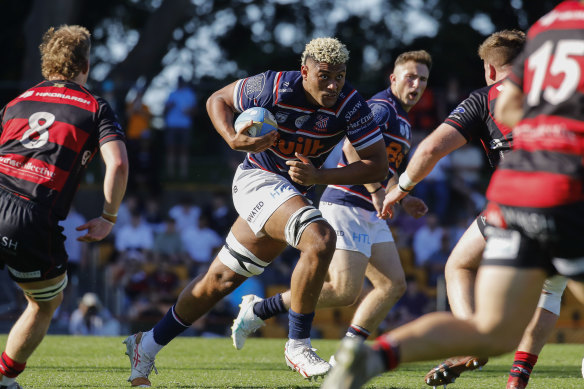 Easts lock Miles Amatosero charges forward.