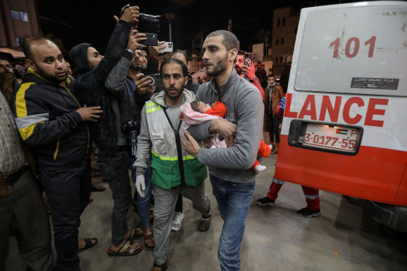 A Palestinian baby injured in Israeli airstrikes is brought to Nasser Medical Hospital in Khan Younis.