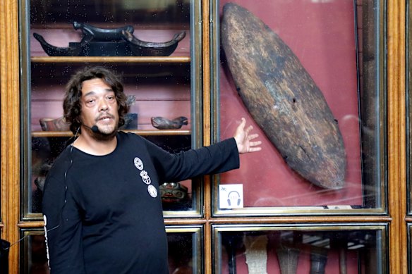 Rodney Kelly in front of the Gweagal Shield at the British Museum.