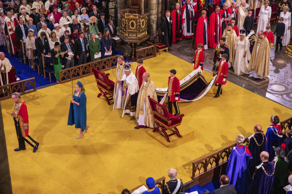King Charles III and Queen Camilla are seen during their coronation ceremony, which was aired live by the BBC.