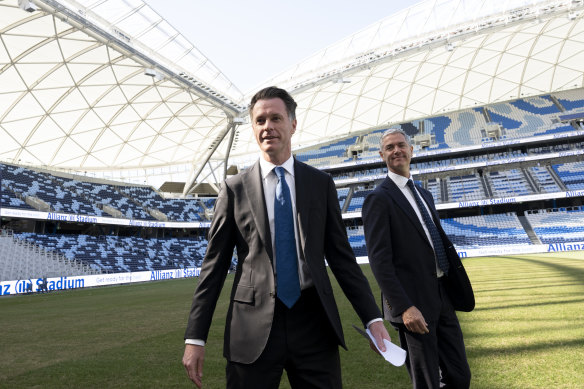 NSW Premier Chris Minns, with Minister for Music and the Night-time Economy, John Graham, at Allianz Stadium on Wednesday. The government have committed to an increase in the number of live events allowed from 4 to 20 per year.