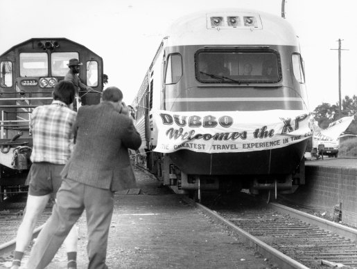 Train enthusiasts greet the XPT as it arrives in Dubbo.