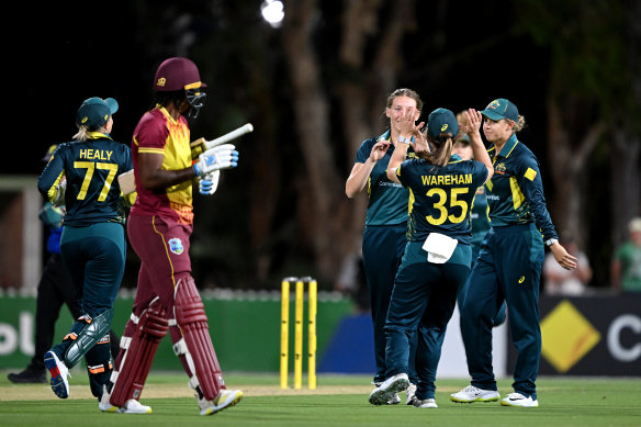 Darcie Brown of Australia celebrates taking the wicket of Chinelle Henry.