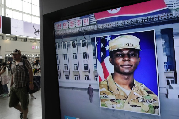 A TV screen shows a file image of American soldier Travis King during a news program at the Seoul Railway Station in Seoul, South Korea, on Wednesday.