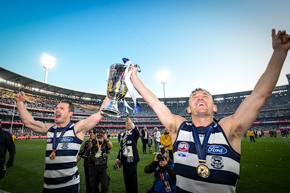 Dangerfield and Joel Selwood soak up the 2022 premiership. 