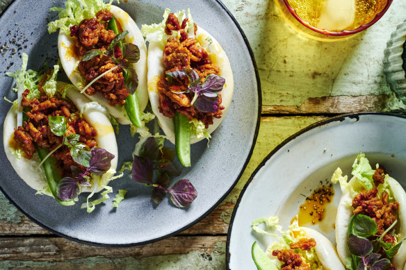 Store-bought bao are stuffed with pork fried with chilli jam and crunchy cucumber.
