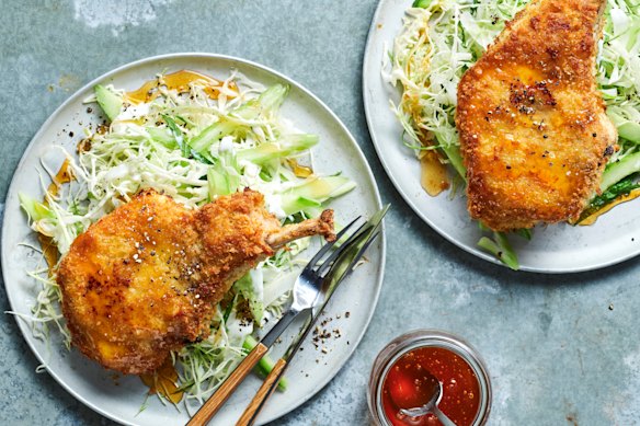 A cool slaw cuts through the richness of panko-crumbed pork cutlets glazed with hot honey.
