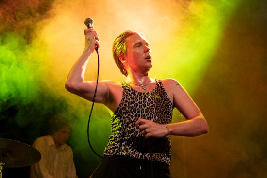 Alex Cameron performing in
Sydney in late 2022. He says fans come to see him “create a spectacle on the knife’s edge” while he sings about the “table-for-one guy” starved of purpose.