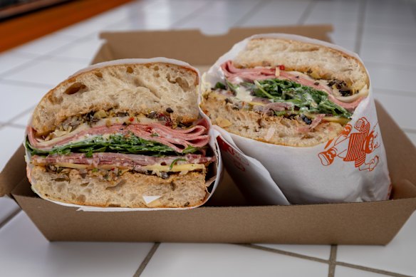 The chopped antipasti mix features on the top and bottom slices of the focaccia.