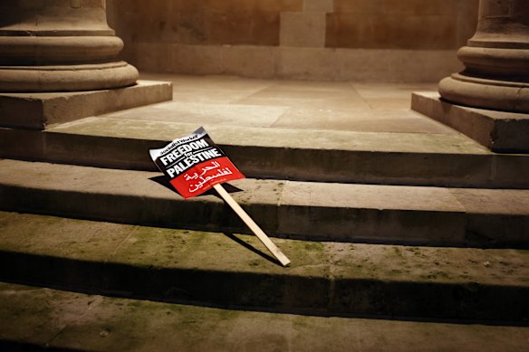 A placard stating “Freedom for Palestine” lays on the steps outside the BBC in London, England.