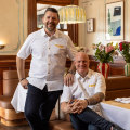 Manu Feildel with Laundy Hotel’s group executive chef Jamie Gannon.