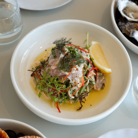 Rare tuna pasta with rocket, capers and chilli. 