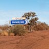 On the outskirts of Karijini National Park, the sign for Solomon Mine in the Pilbara Region in Western Australia.