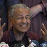 'Chaos' in Malaysian politics as both sides fight over the same PM