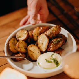 Rosemary and garlic potatoes with sour cream. 