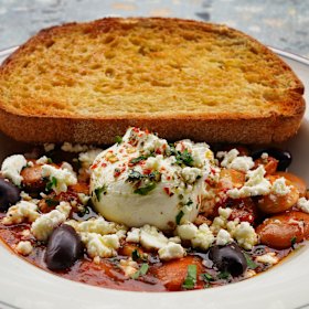 Claypot butter beans in a tomatoey gravy with black olives, a poached egg and a sprinkling of crumbly feta.