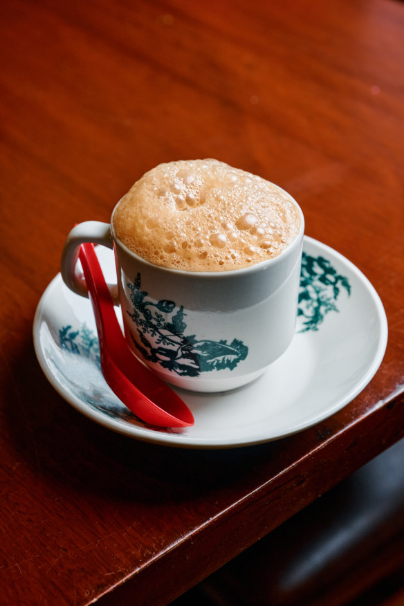 Hot teh tarik (sweet, creamy tea).