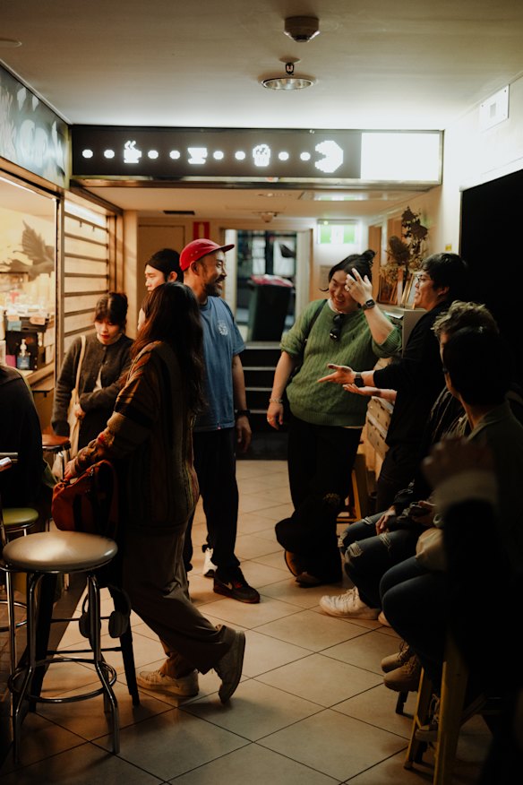 Customers outside a cupping session at Diggy Doos.