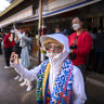 A tourist takes a photo at the Jokhang Temple in Lhasa in western China’s Tibet Autonomous Region, where tourism is booming.