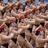 Vietnamese female police officers march during a parade celebrating the 50th anniversary of the end of the Vietnam War in Ho Chi Minh City.