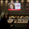 The face of the newly released hostage, Keren Munder, 54, is projected onto the wall outside The Museum of Modern Art known as the ‘The Hostages and Missing Square’  in Tel Aviv.