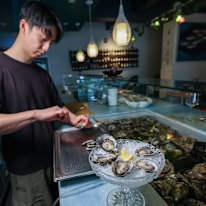 Oyasters are shucked to order at Olala.
