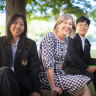 Camberwell High School principal Jillian Laughlin and international students Ryan Shan and Meilee Rianrukwong. 