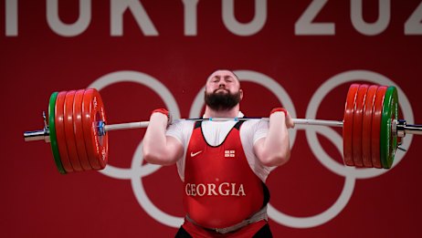 Lasha Talakhadze of Georgia competes in the men’s +109kg weightlifting event, at the 2020 Summer Olympics, Wednesday, Aug. 4, 2021, in Tokyo, Japan. (AP Photo/Luca Bruno)