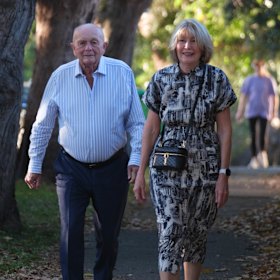 Gerry Harvey and wife Katie Page arrive at Lachlan Murdoch’s annual Christmas party at his Bellevue Hill mansion last year.