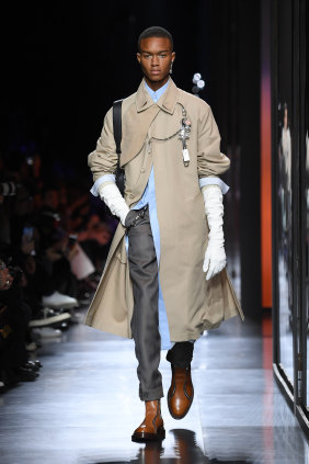 Long gloves were a staple at Dior Homme.