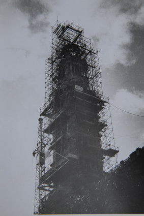 Scaffolding surrounds the clock tower in 1964.