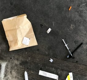 Syringes and other drug paraphernalia left by drug users at the Richmond public housing estate near the North Richmond safe injecting room.