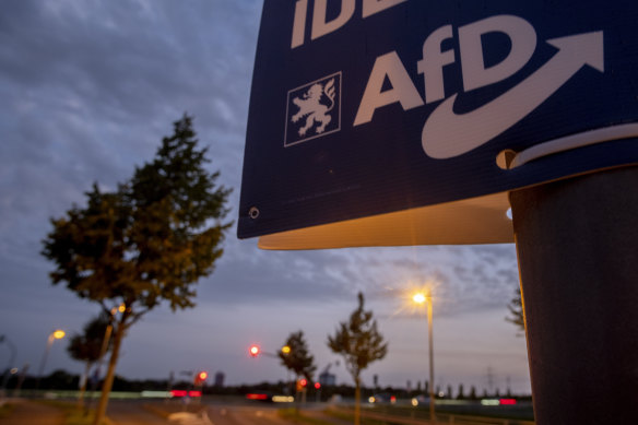 An election poster of right wing party AfD is fixed on a pole during the Hesse federal state election in Frankfurt, Germany.