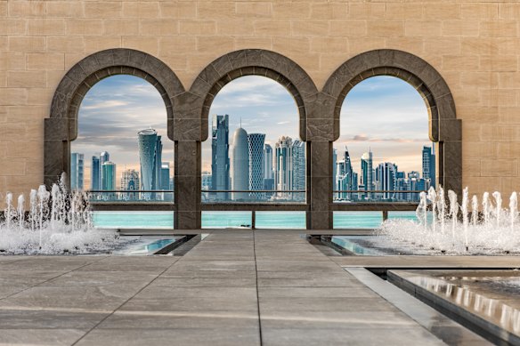 Doha’s skyline through the arches of its Museum of Islamic Art. 
