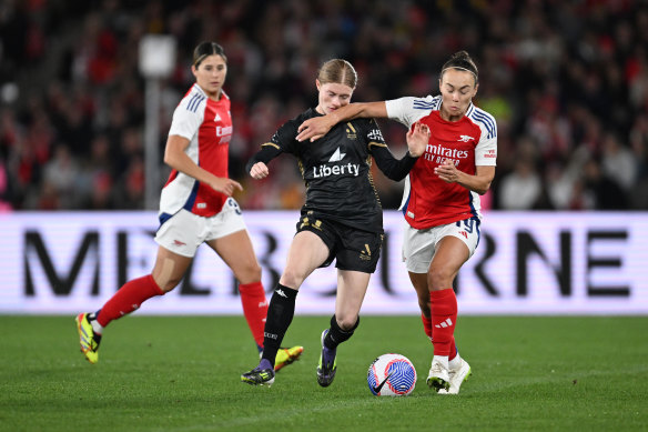 Caitlin Foord of Arsenal and Cortnee Vine of the A-League All Stars contest the ball during the exhibition match.