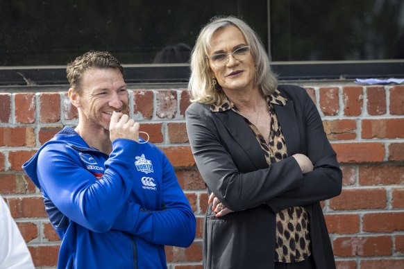 Dani Laidley (right) with former North Melbourne player Brent Harvey at a club function last year.