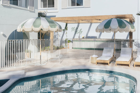 Relax under a scallop-fringed umbrella at Motel Molly.