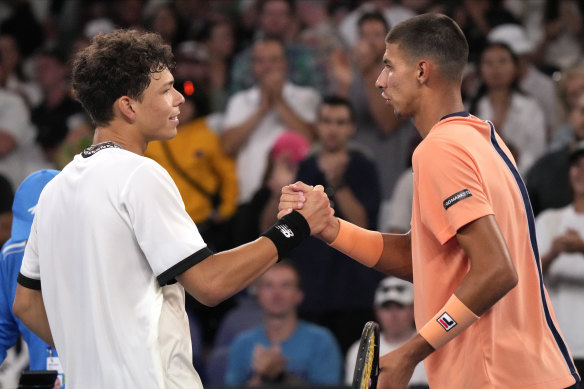 Ben Shelton (left) is congratulated by Alexei Popyrin.