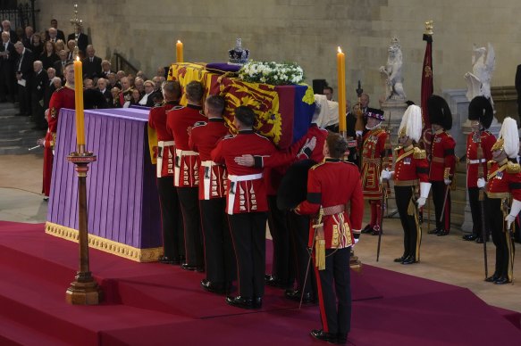 The coffin arrives at Westminster Hall, where it will remain for the next four days.