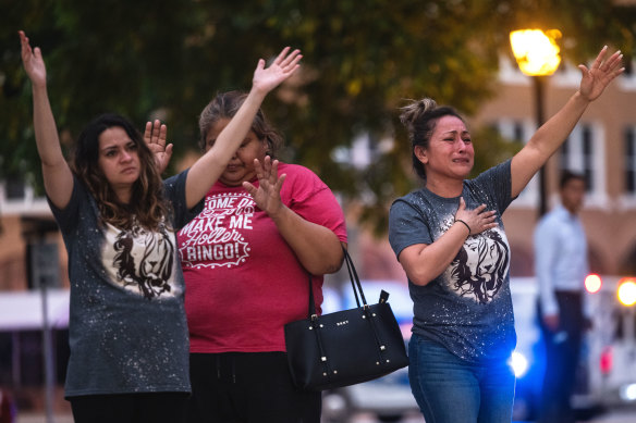 People at the City of Uvalde Town Square during a prayer vigil in the wake of a mass shooting at Robb Elementary School on May 24, 2022 in Uvalde, Texas. According to reports, 19 students and 2 adults were killed before the gunman was fatally shot by law enforcement. 
