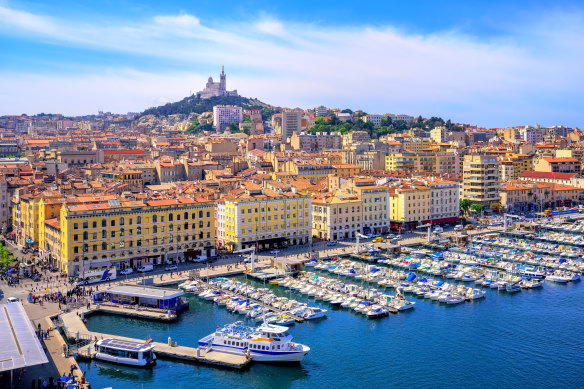 The old port with the Basilica of Notre Dame de la Garde on the hill beyond.