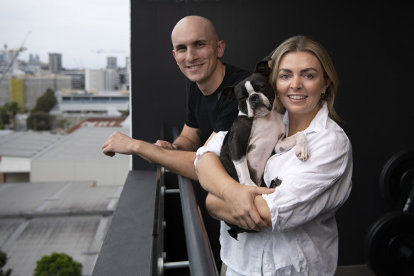Kaitlin Kloss with her fiancé Brendon Peters and their dog Gus