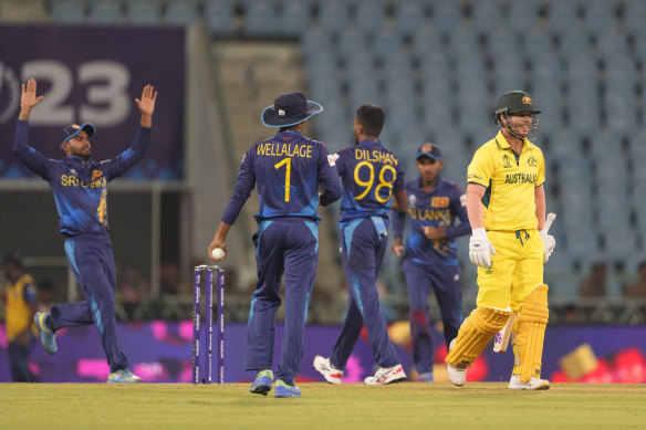 David Warner leaves the crease annoyed at his lbw dismissal against Sri Lanka on Monday.